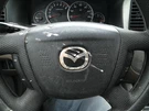 Air Bag Driver Wheel Cylinder Vinyl Fits 05-06 Mazda Tribute 104959544. Fixed Price $250.00.