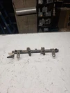1995-1997 Dodge Stratus 2.4L Fuel Injectors W/ Rail. Fixed Price $99.99.
