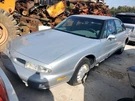 Air Bag Passenger Fits 98-99 Eighty 1852289. Fixed Price $135.00.
